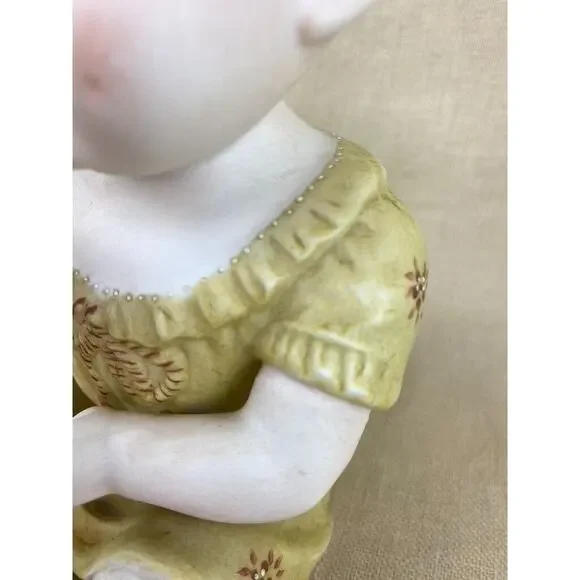 Vintage Bisque Porcelain Piano Baby Figurine 7”